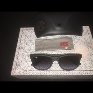 Matte black Ray-Ban wayfarer sunglasses